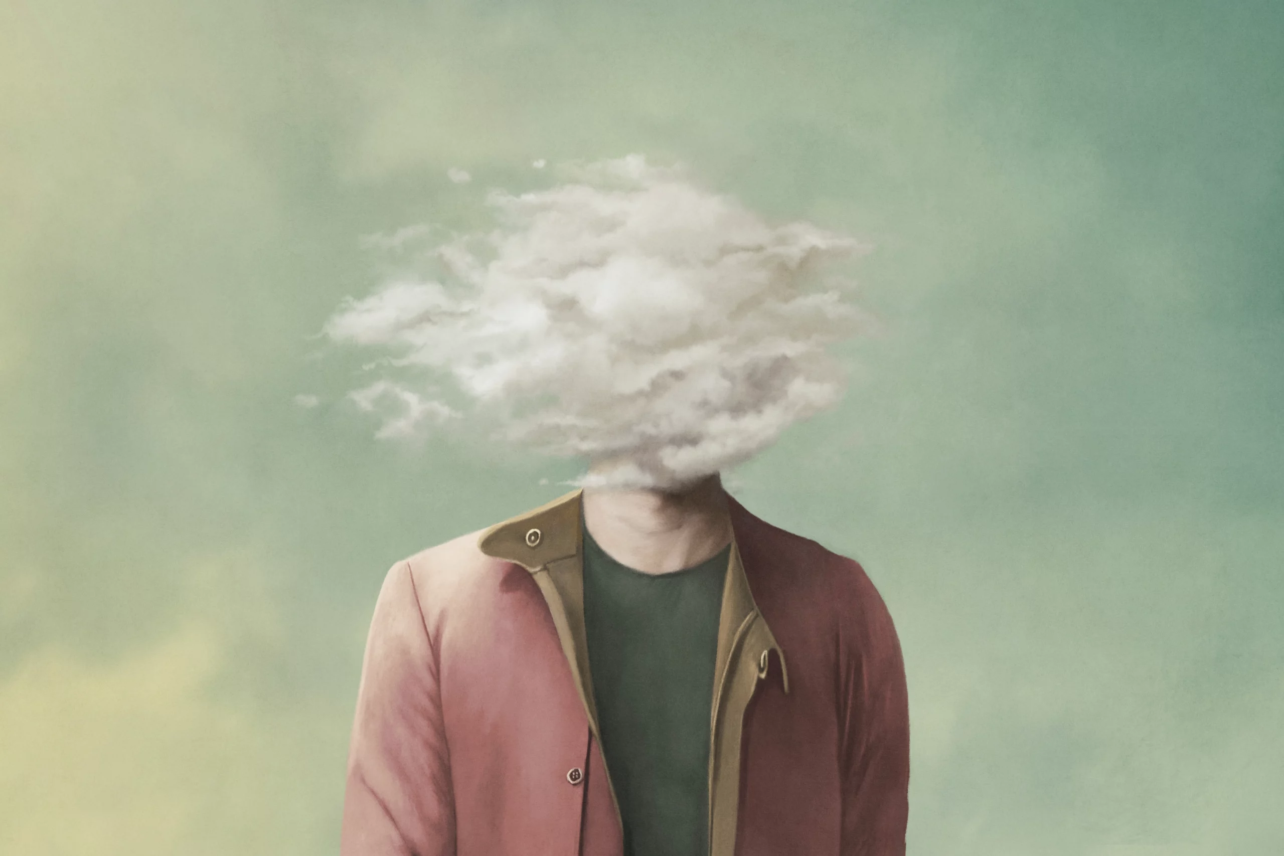 a man has difficulty thinking clearly shown by his head obscured by a cloud